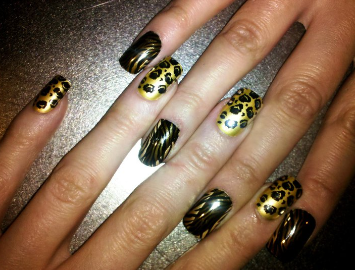 rihanna tiger print nails. The nails lasted for over a